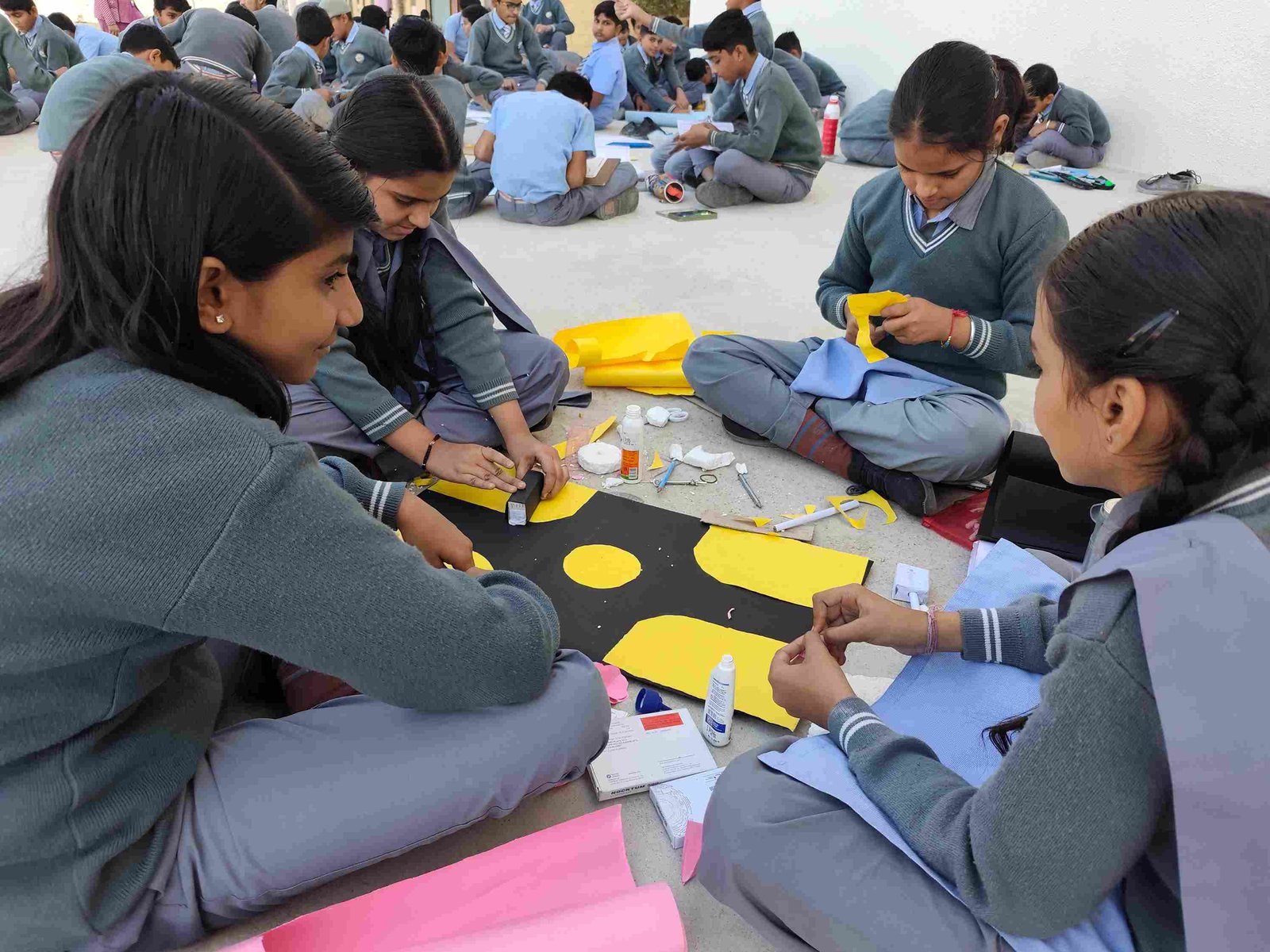 Students doing creative craft activities